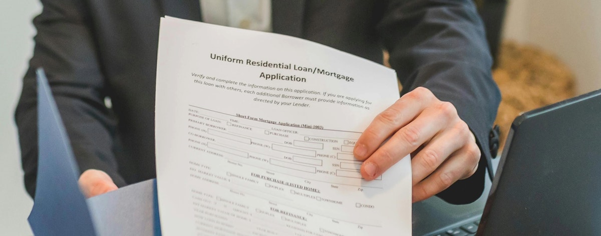 Someone holding a loan application.