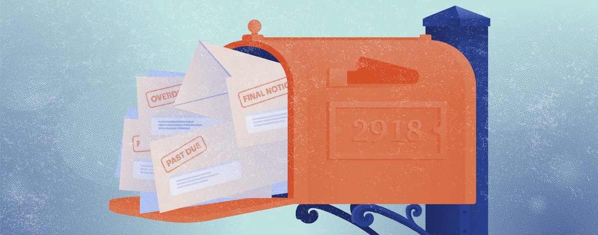 A mailbox stuffed full of past due notices.